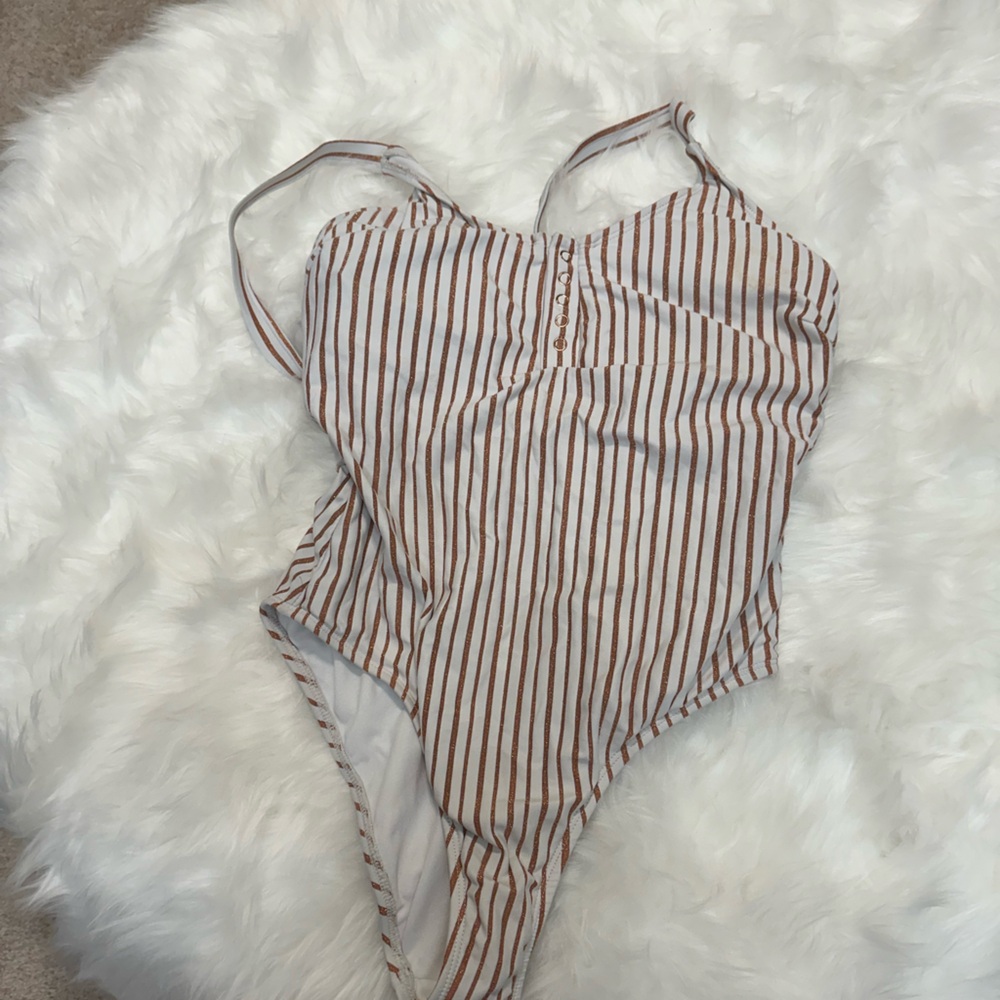 Women size (large 12 USA) one piece bathing suits some never worn some worn once